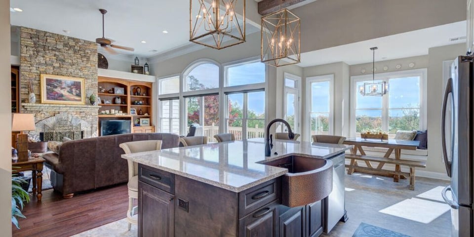 Remodeled Atlanta home with an island-centric kitchen, bay windows, and vaulted ceiling.