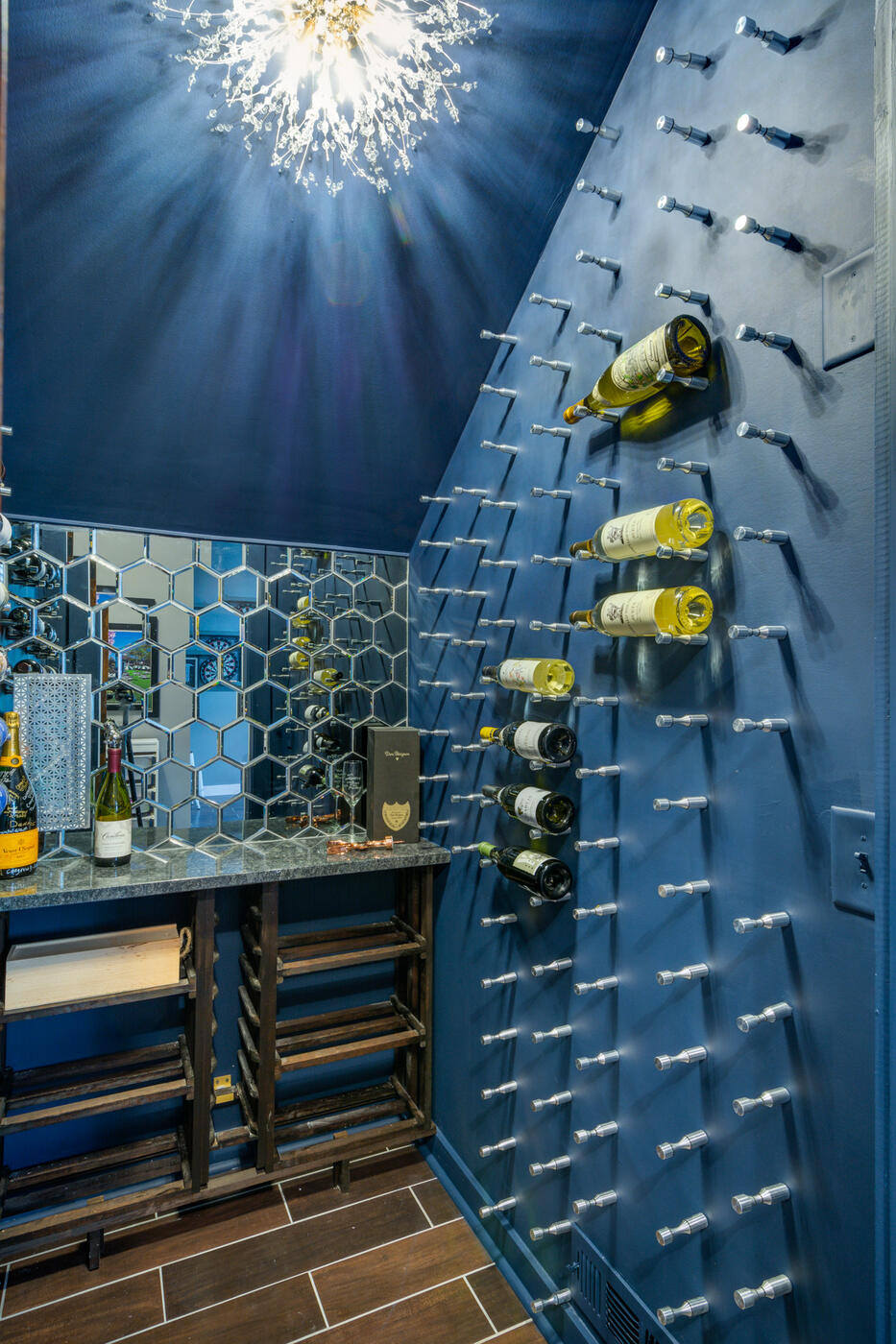 Contemporary wine nook with blue accent wall in Atlanta basement remodel by Silver Oak Remodel