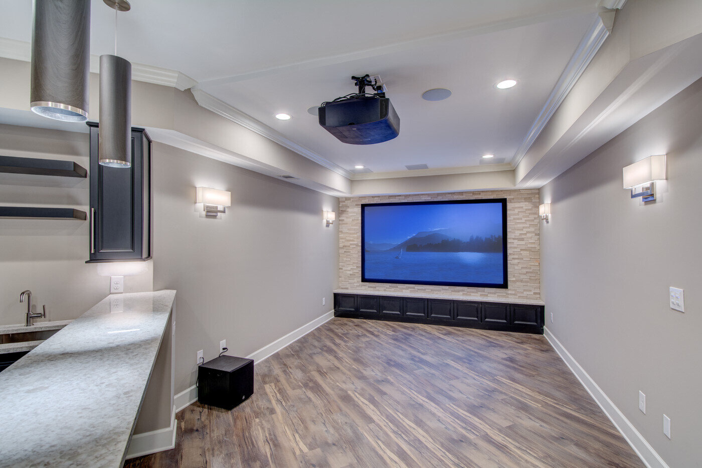Expansive basement remodel with dual media zones by Silver Oak Remodel in Atlanta, GA