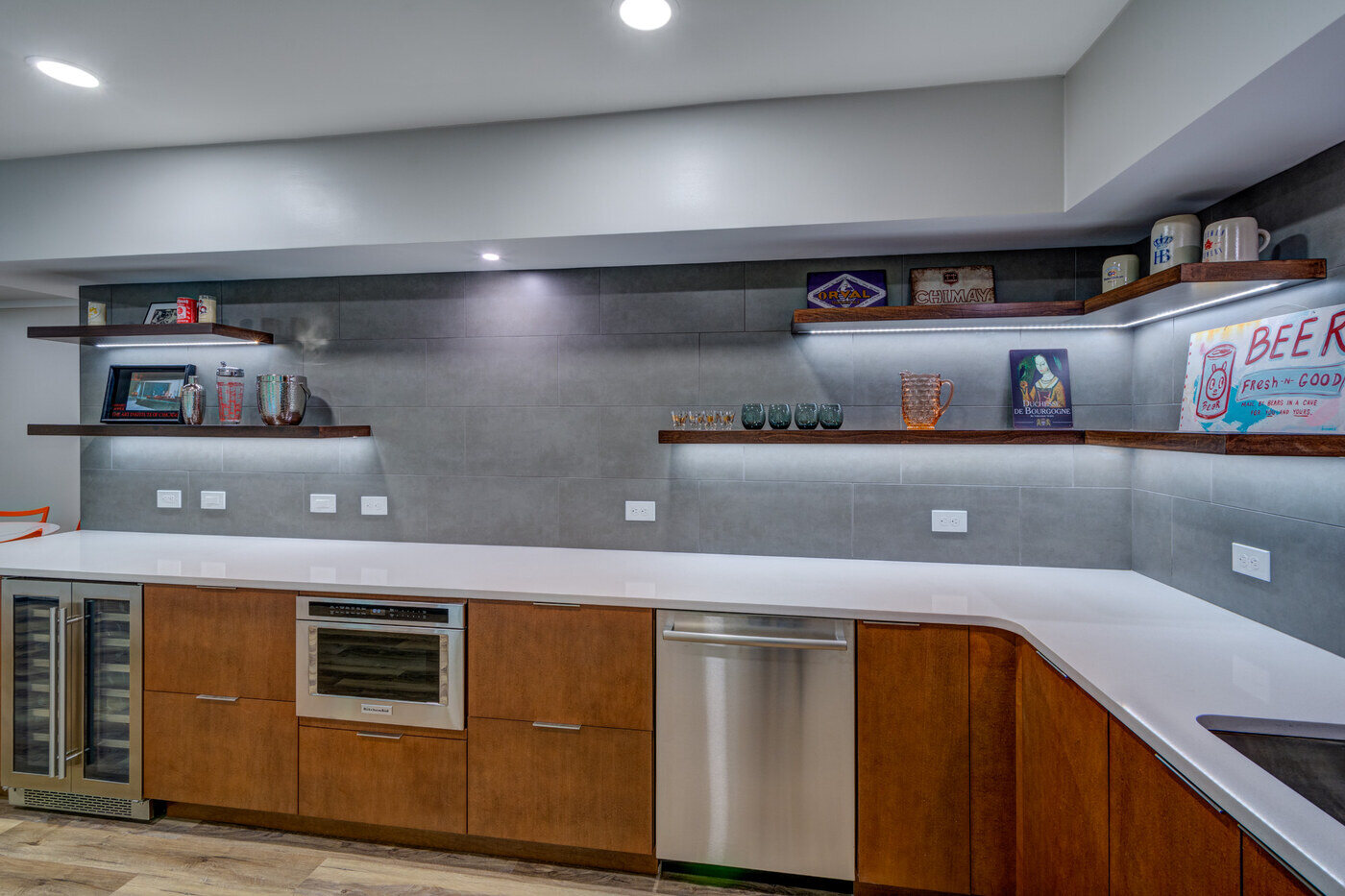 Modern basement kitchenette remodel in Atlanta GA with wood cabinetry and floating shelves by Silver Oak Remodel