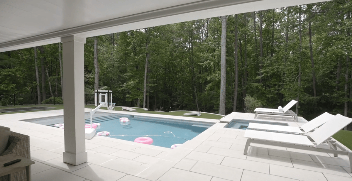Remodeled Silver Oak basement with covered access to a pool and outdoor living area in Atlanta, GA.