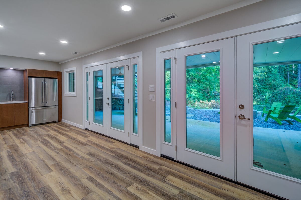 basement remodel in atlanta, ga with two double doors glass by silver oak remodel