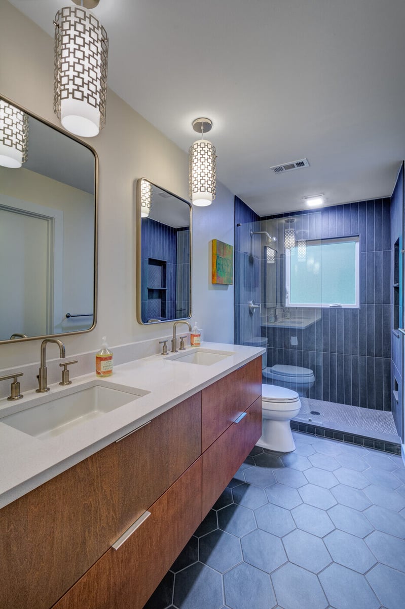 Modern bathroom remodel in Atlanta, GA with floating vanity and glass shower by Silver Oak Remodel