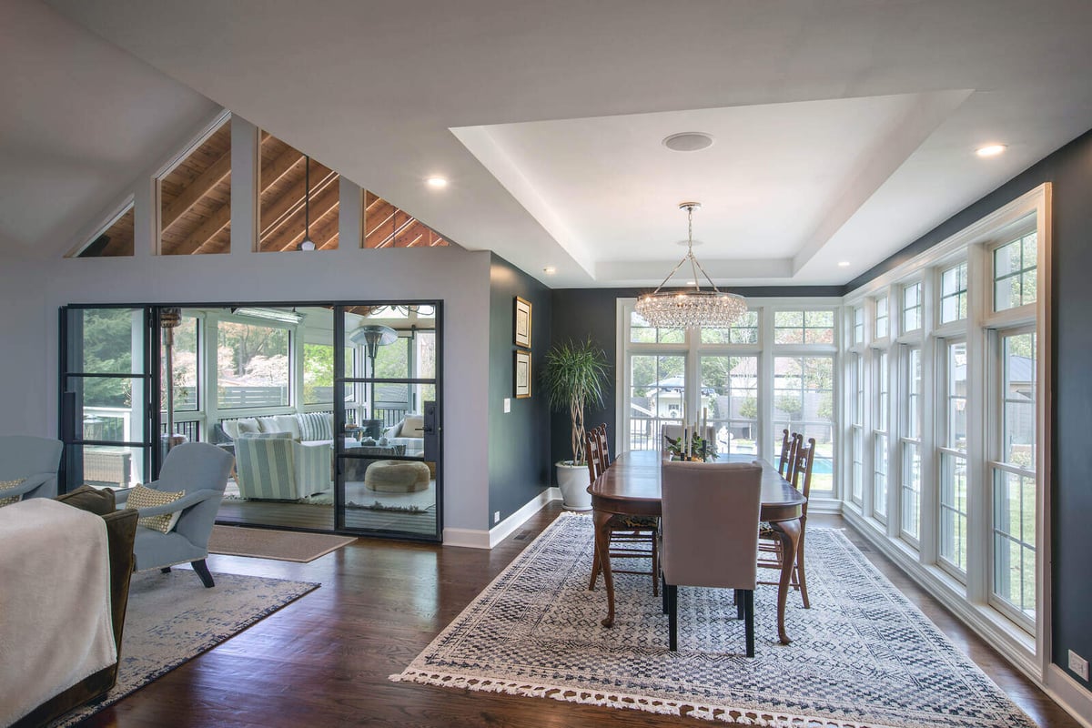 Open dining area in East Cobb remodel by Silver Oak Remodel showing connection to new porch addition