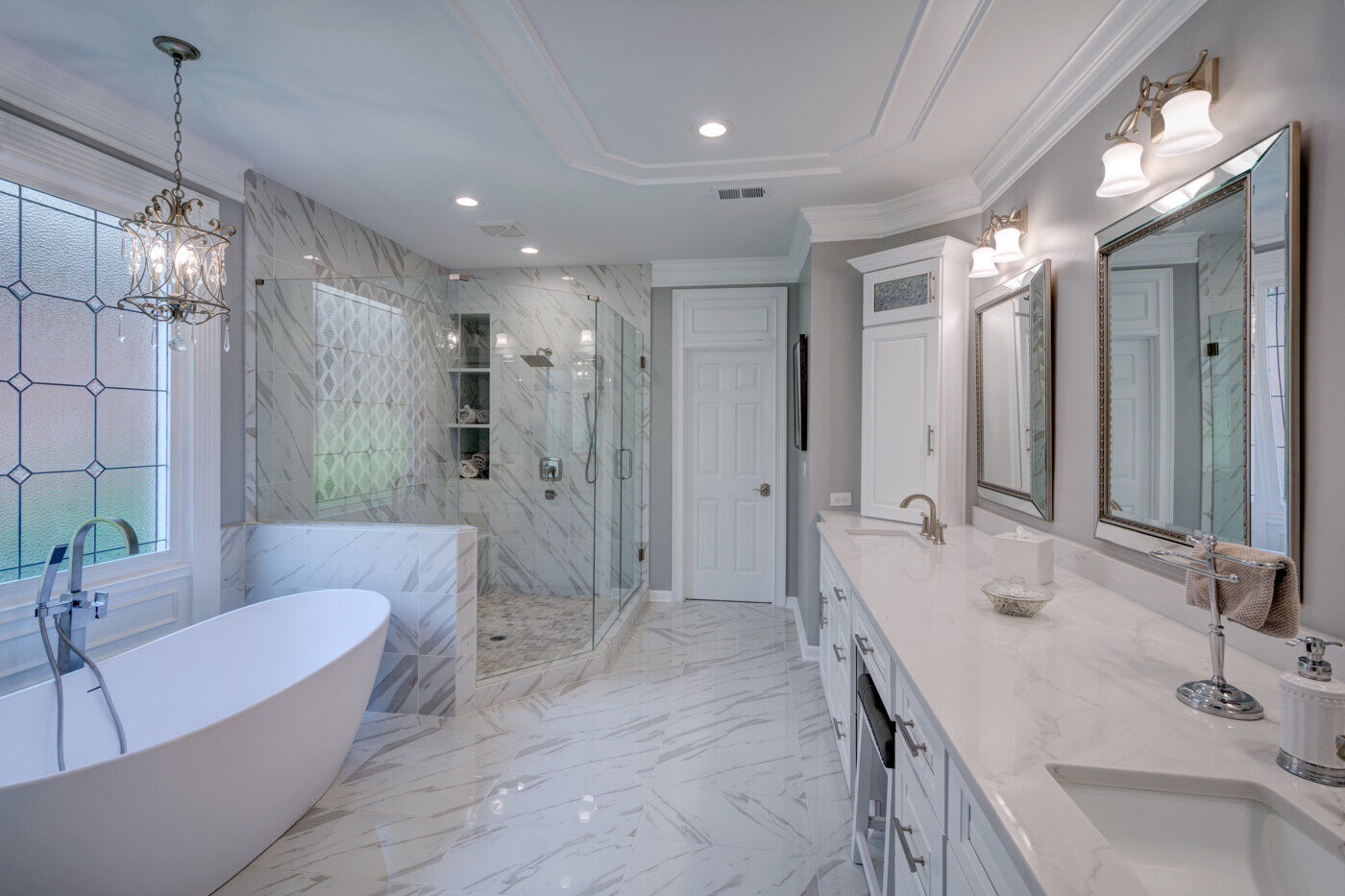 Spa-inspired bathroom remodel in Atlanta, GA by Silver Oak Remodel with walk-in shower and soaking tub