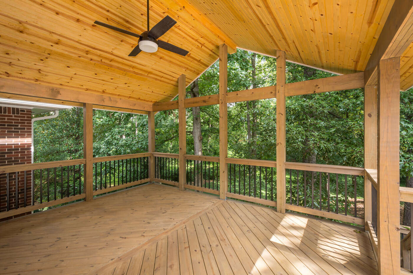 Covered wood deck with vaulted ceiling completed by Silver Oak Remodel in Atlanta, GA