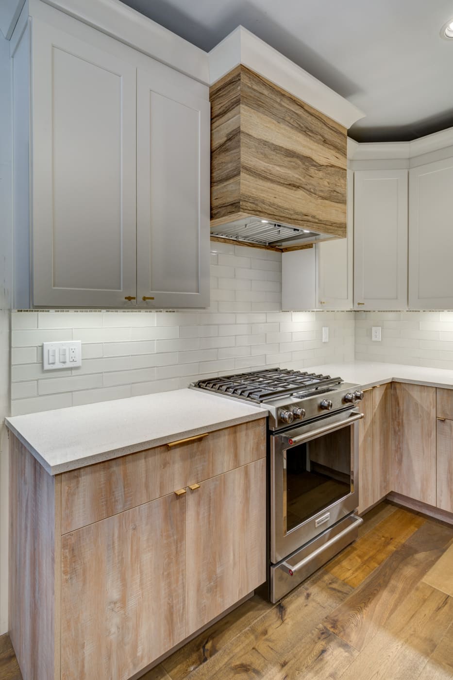 Atlanta kitchen renovation with light wood cabinetry and subway tile backsplash by Silver Oak Remodeling