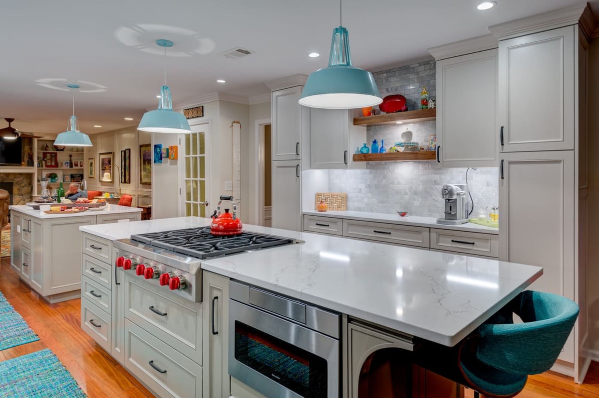 Bright kitchen renovation with marble countertops and colorful decor by Silver Oak Remodeling in Atlanta