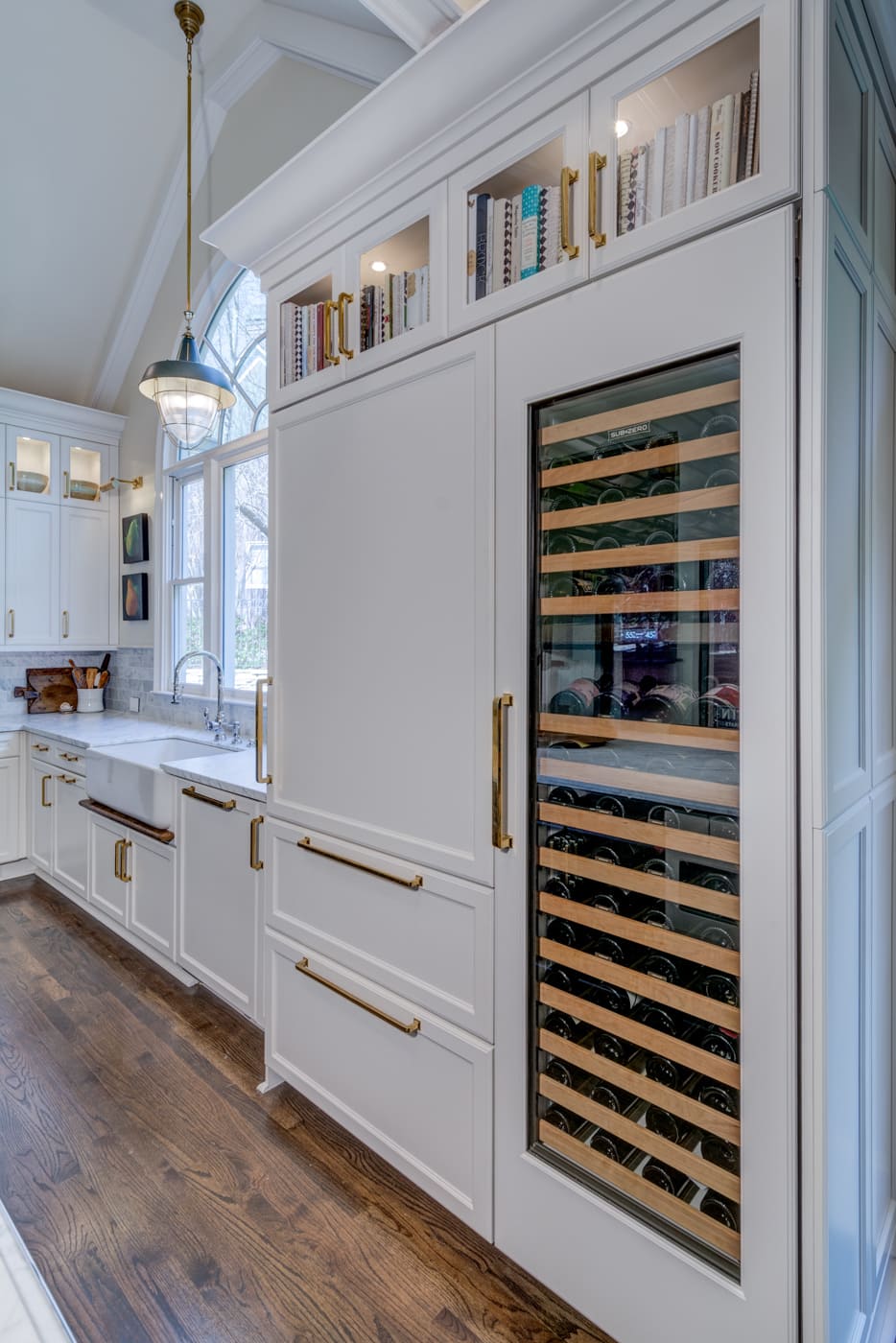 Custom kitchen wall with integrated fridge and wine storage by Silver Oak Remodeling in Atlanta