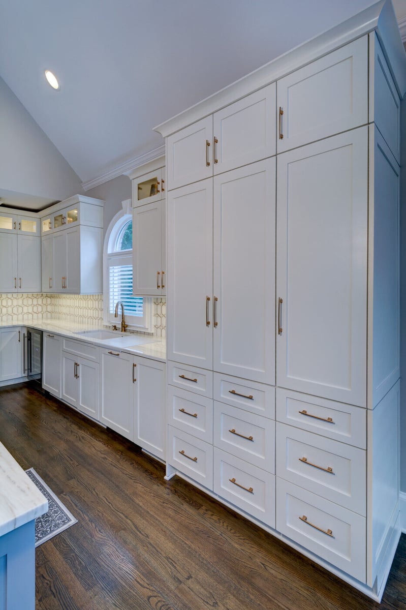 Custom white cabinetry and tile backsplash in Sandy Springs, GA kitchen remodel by Silver Oak Remodel