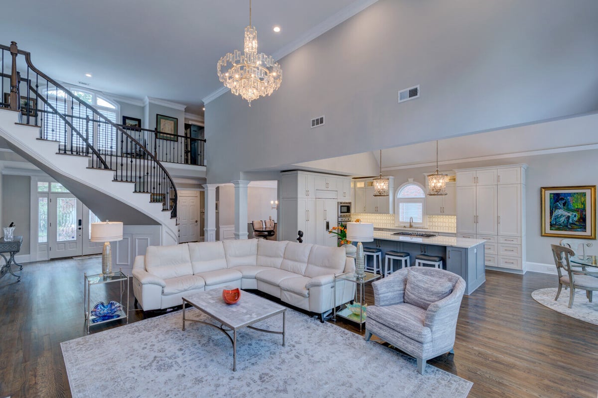 View of kitchen and living room remodel with vaulted ceilings in Sandy Springs, GA by Silver Oak Remodel