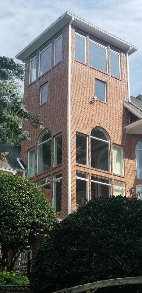 Rear exterior of custom-built home on raised foundation by Silver Oak Remodeling in Atlanta, GA