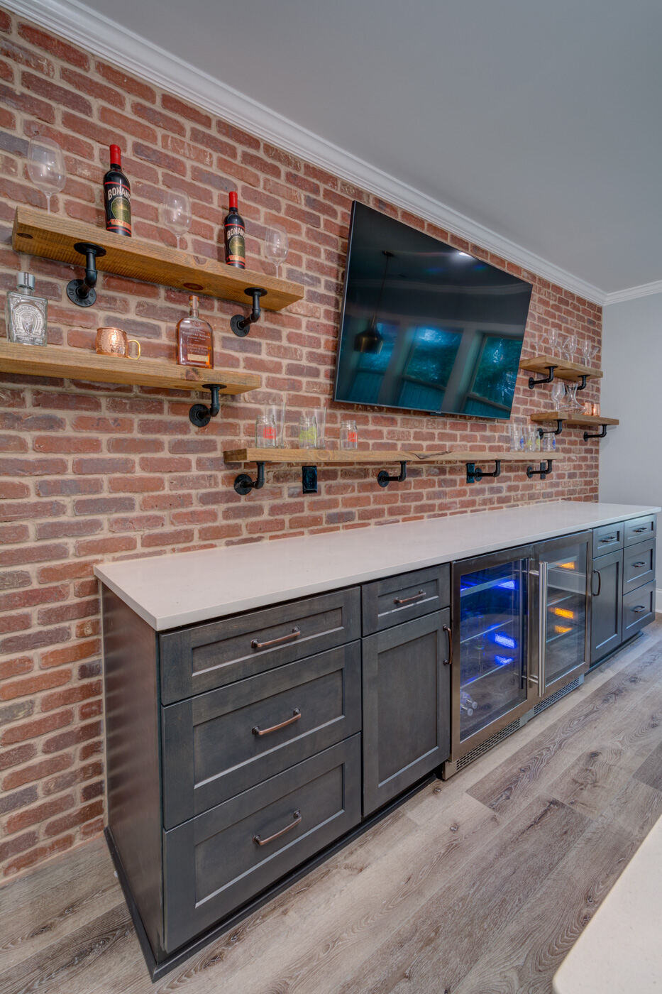 Close-up of custom bar cabinetry and shelving in Atlanta basement remodel by Silver Oak Remodel