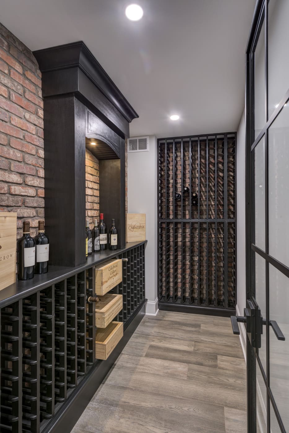 Traditional wine storage design in basement remodel by Silver Oak Remodeling, Atlanta