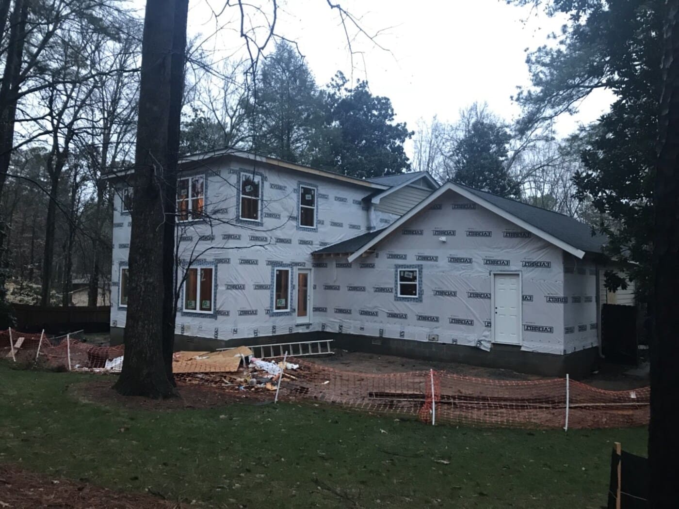 Home exterior renovation in progress with Tyvek wrap in Atlanta by Silver Oak Remodeling