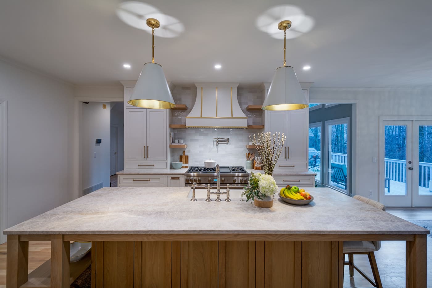 Elegant white and wood kitchen island in a custom home build by Silver Oak Remodeling in Atlanta, GA