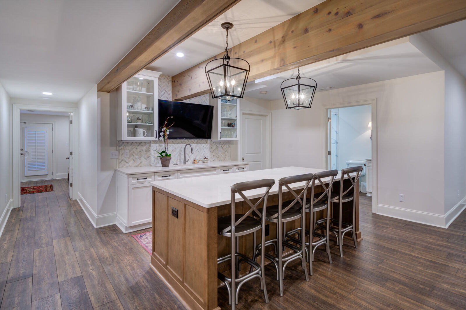 Basement kitchen remodel with wood beams and quartz island by Silver Oak Remodel in Roswell, GA Basement kitchen remodel with wood beams and quartz island by Silver Oak Remodel in Roswell, GA